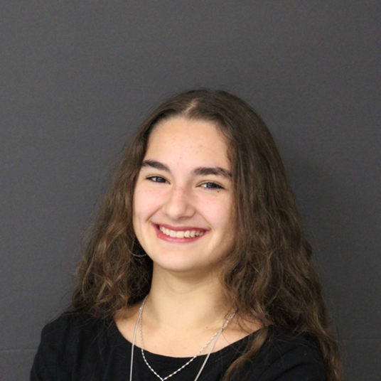Abigail Cribby (they/them) head shot