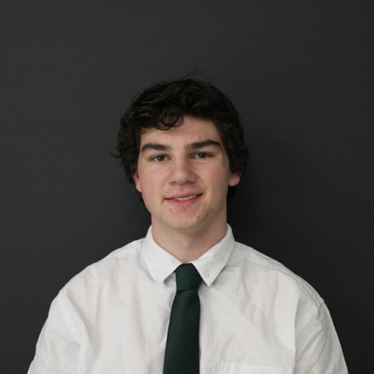 Zach Topscher (he/him) head shot