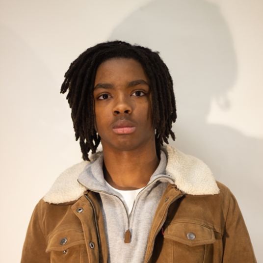 Qur'an Dixon head shot