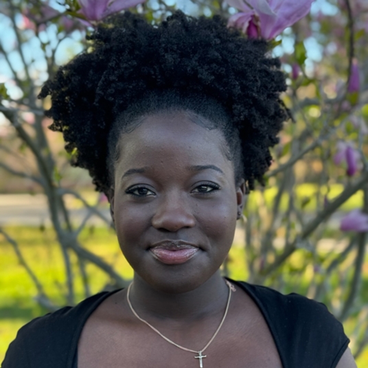 Aiinza Muyenje head shot