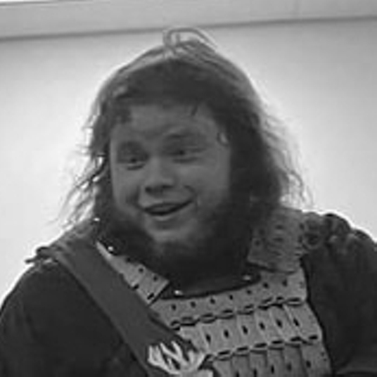 Taylor Wells (he/him) head shot