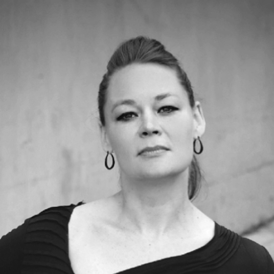 Flyn Ludington (she/they) head shot