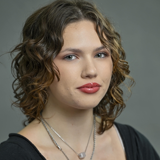 Rhiannon Carlson as Marcia head shot