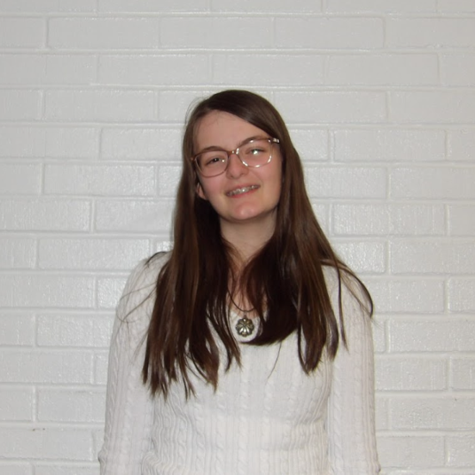 Erin Maxhelaku head shot