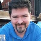 John Rourke Conners head shot