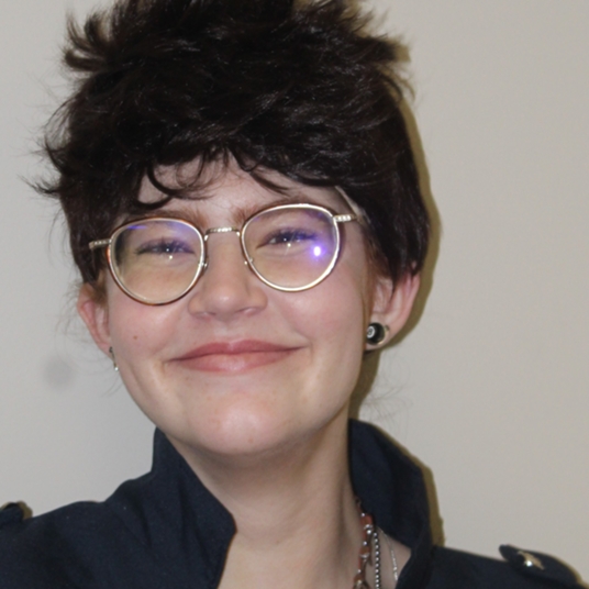 Olivia Delgrosso (She/They/He) head shot